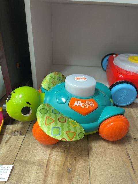 red fisher price turtle